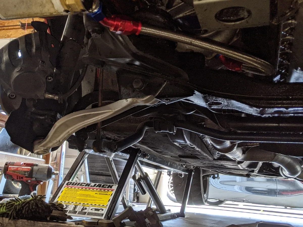 Close undercarriage detail used as privacy-safe workmanship imagery.